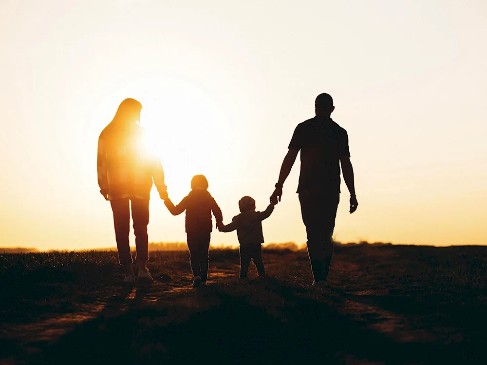 Silhouette of a happy family