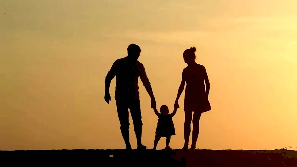 Silhouette of a happy family