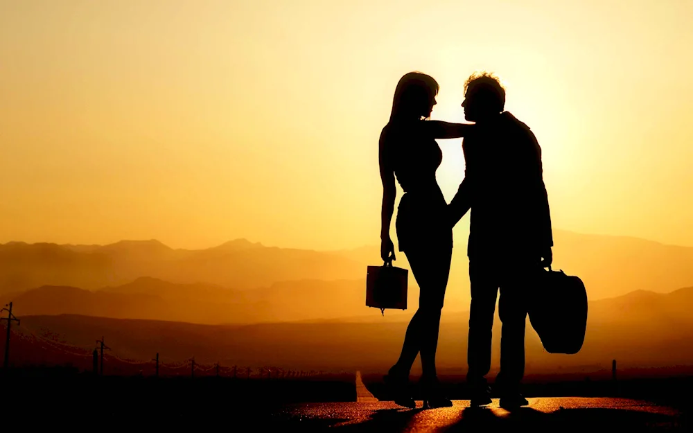 Silhouettes of couples in love
