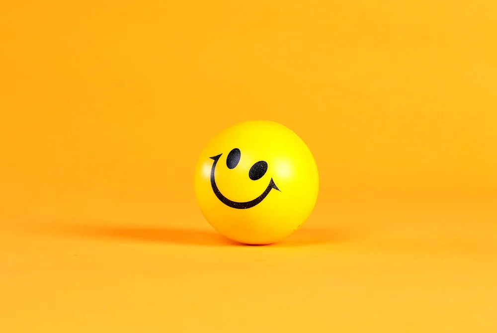 Smiley face on yellow background