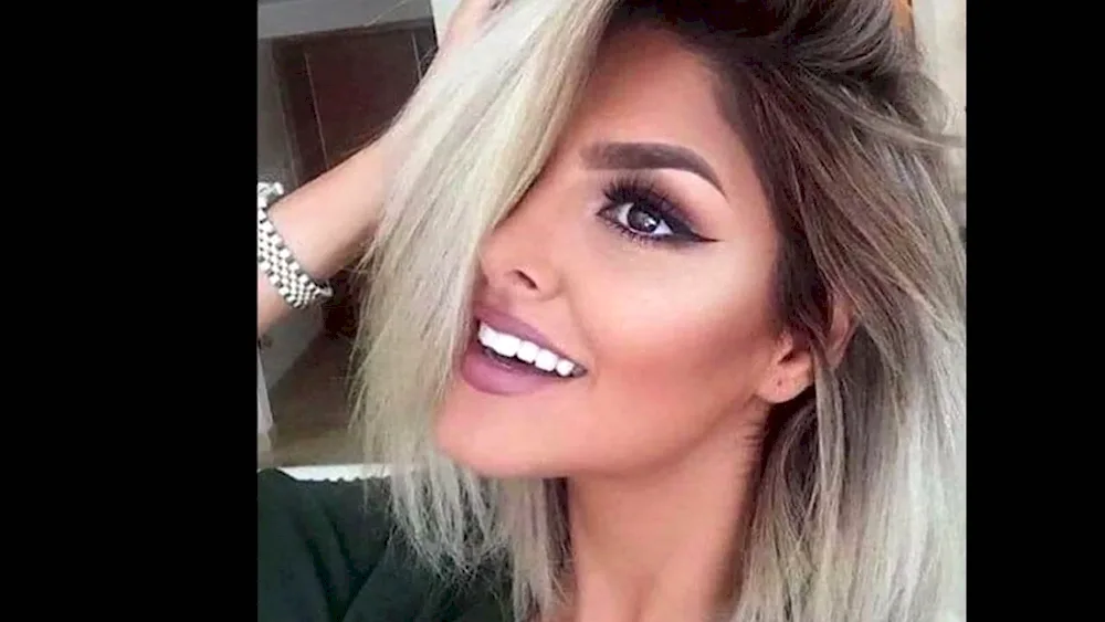 Smokey blonde ash.