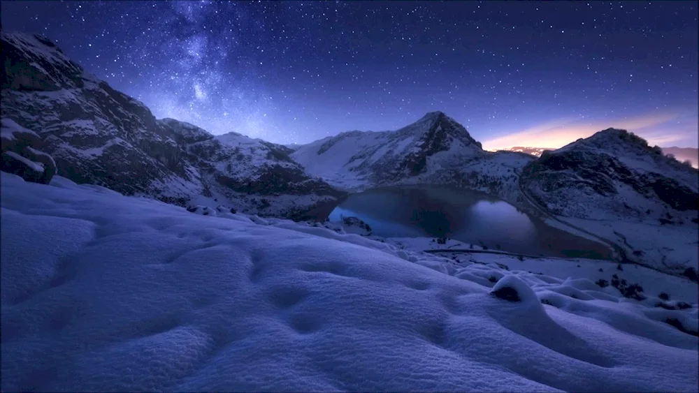 Snowy mountains at night