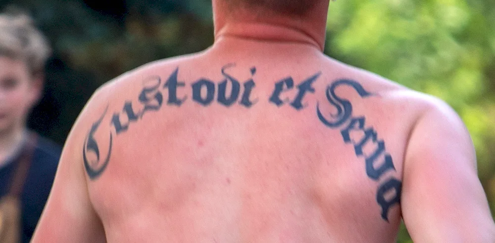 Save and Save tattoo on back