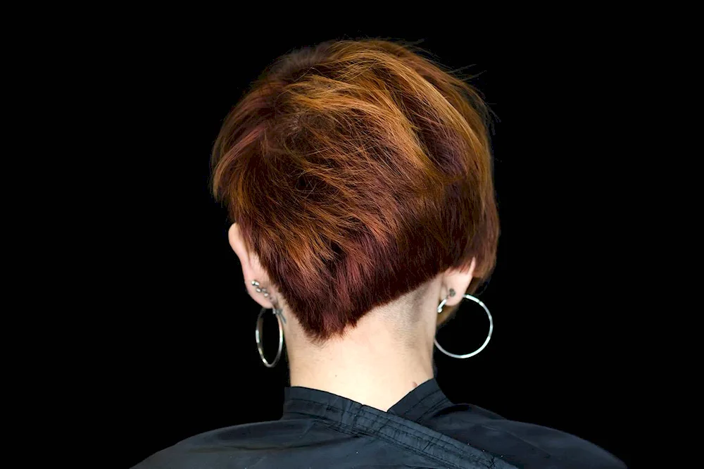 Pixie haircut with extended nape