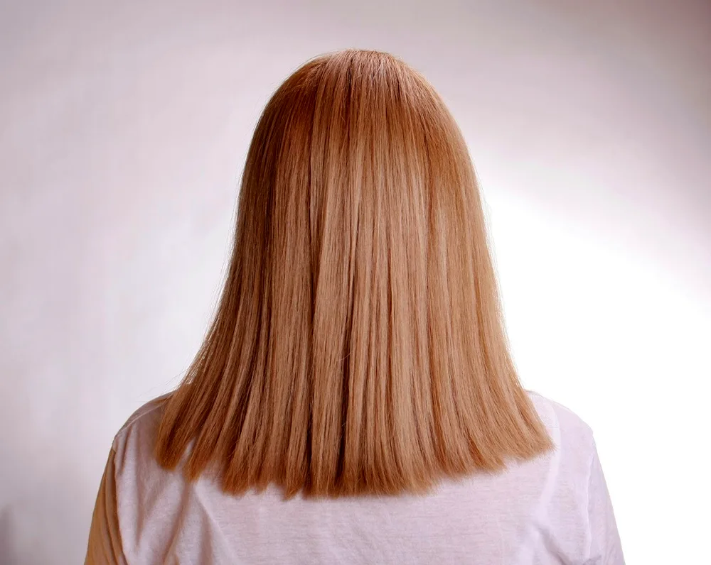 Semi-circle haircut on long hair