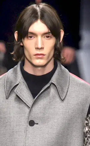 Haircut with middle parting