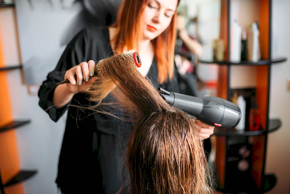 Hairdrying hair in a salon