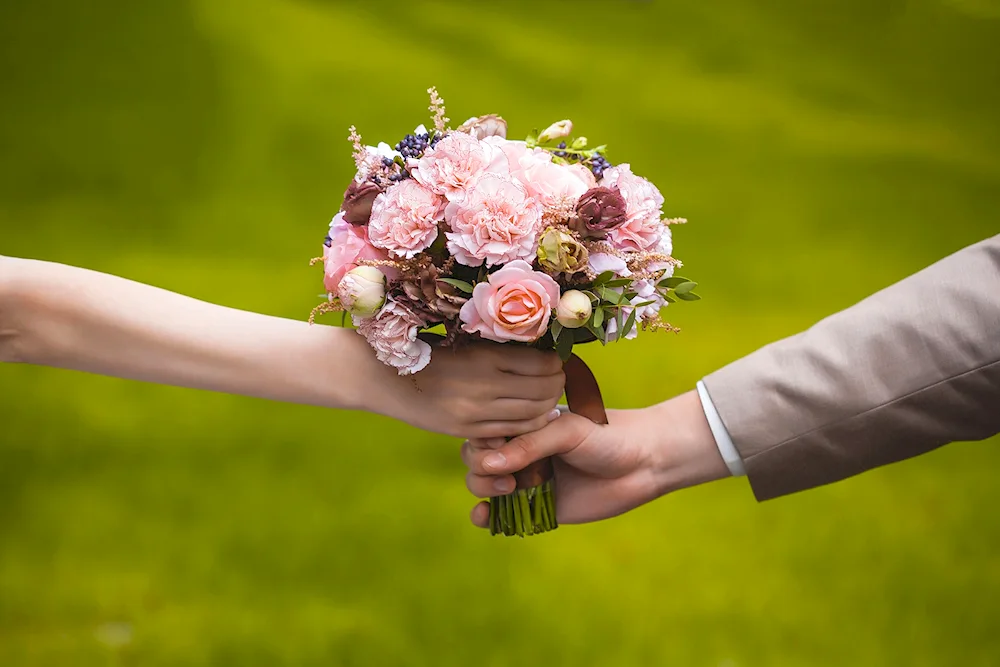 Beautiful flowers in hand