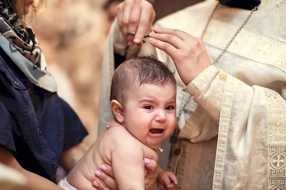 The sacrament of Kira's baptism