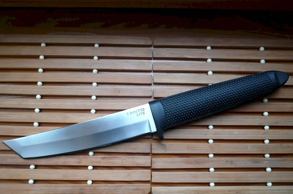 Tanto tanto knife in SPM s90v wooden scabbard on a stand