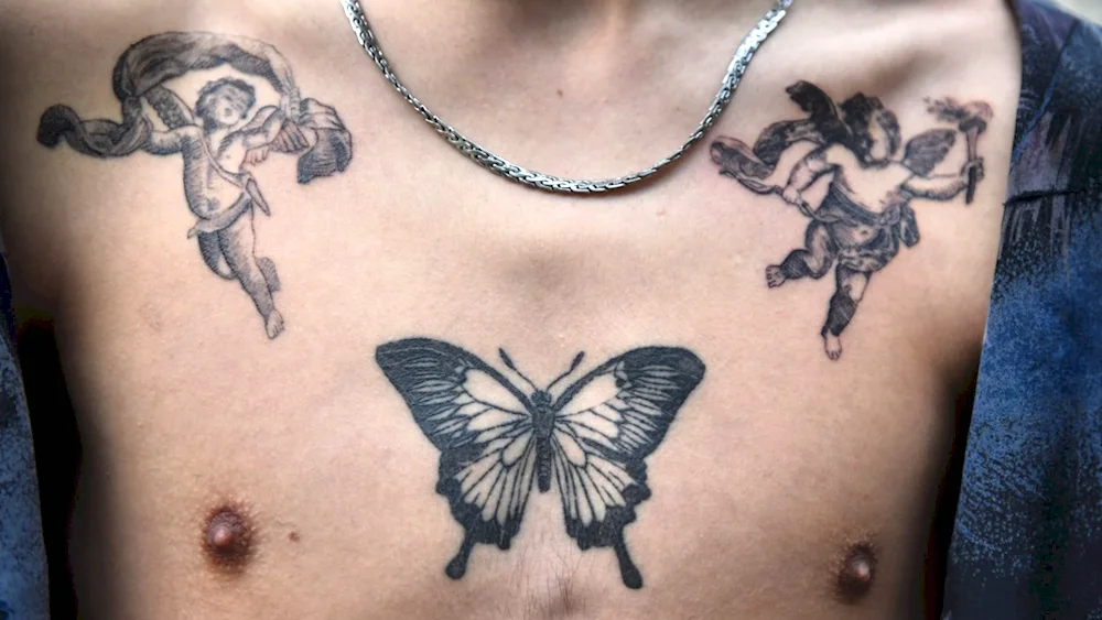 Angel tattoo on collarbone