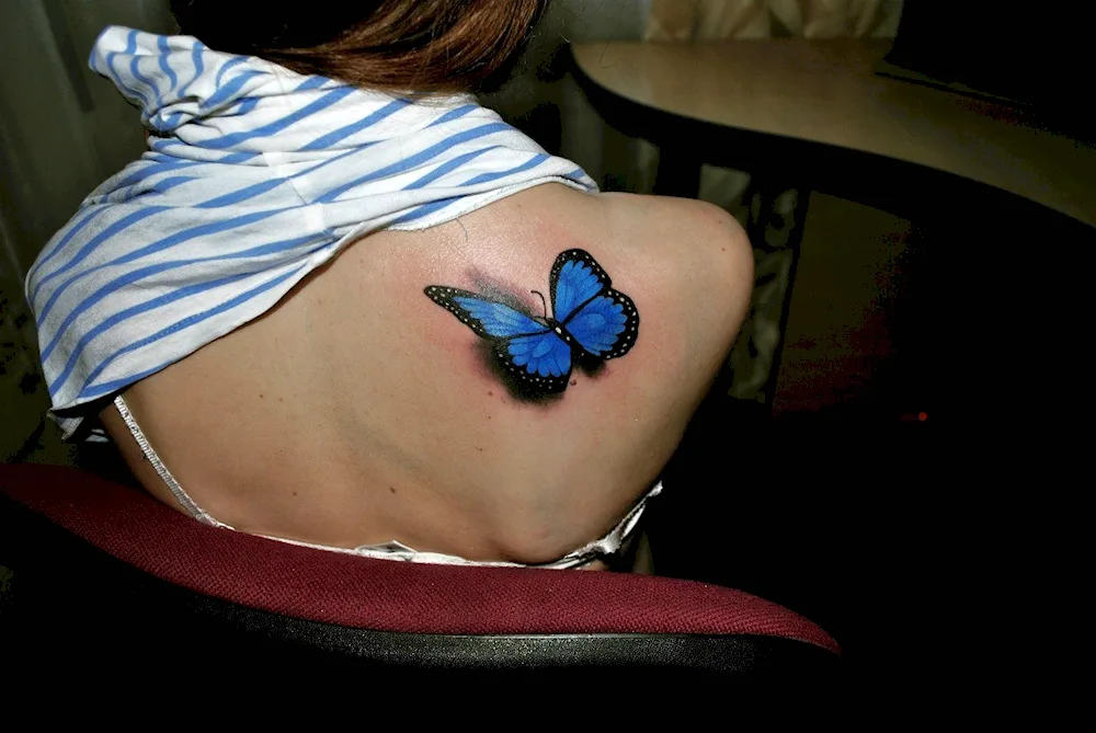 Tattoo on the thigh butterfly tattoo