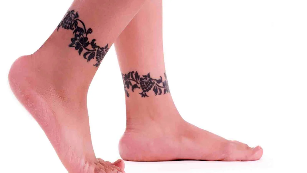 Foot bracelet tattoos for women