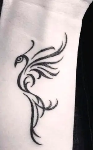 Phoenix tattoo on wrist