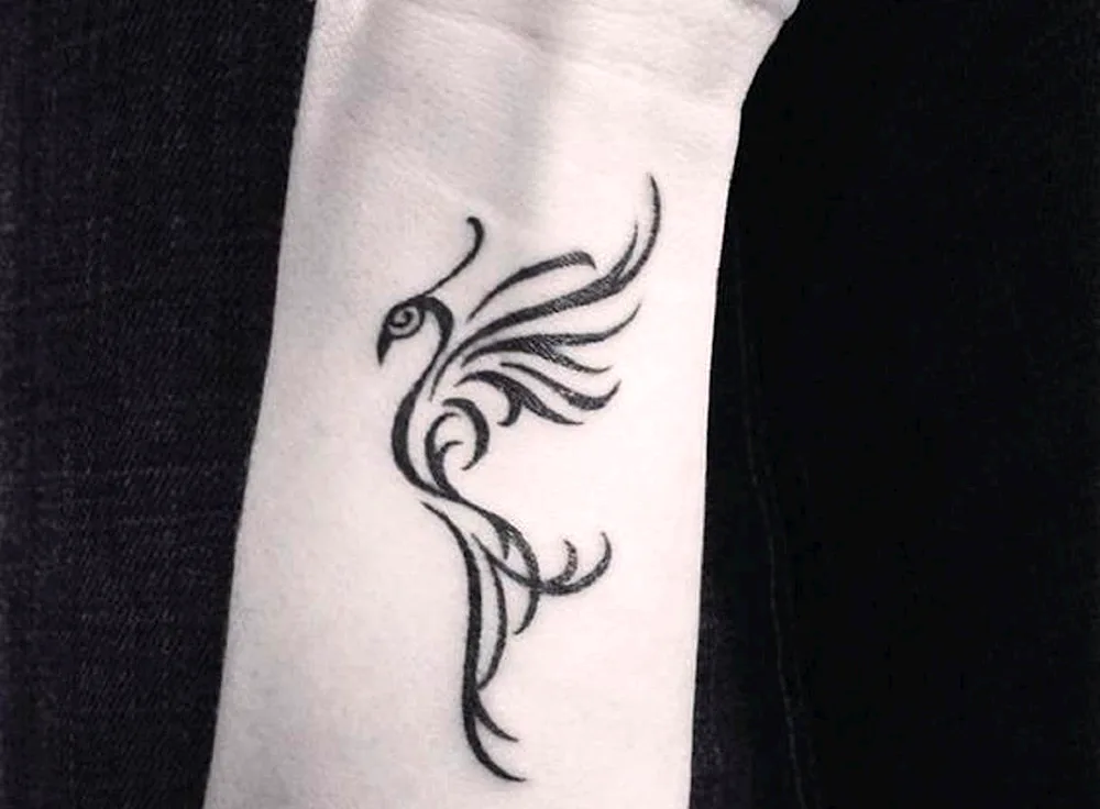 Phoenix tattoo on wrist