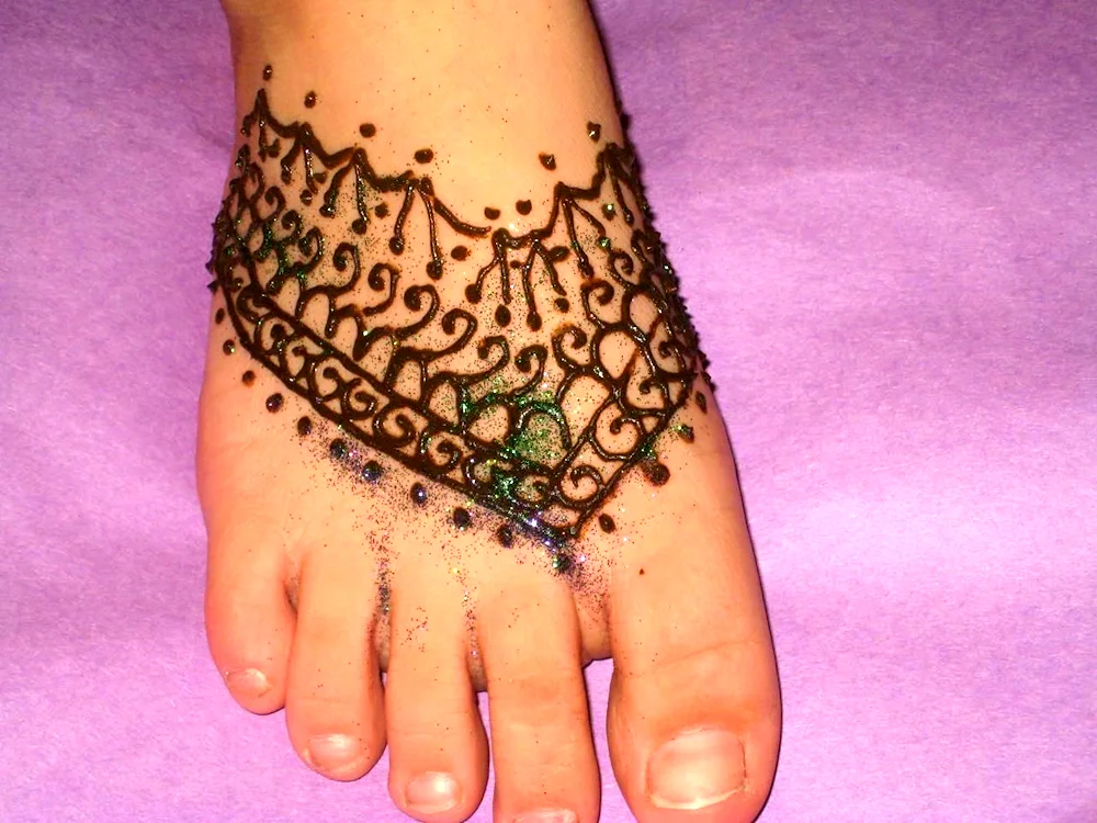 Henna tattoo on the foot