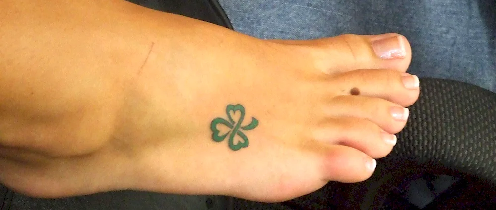 Four-leaf clover tattoo