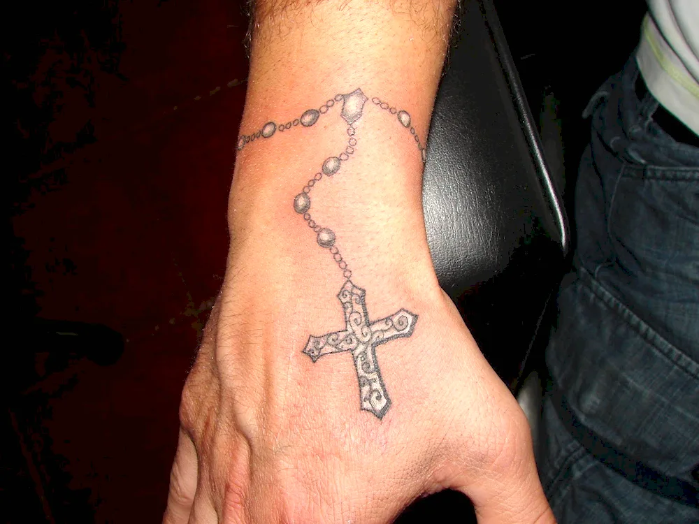 Tattoo cross with chain