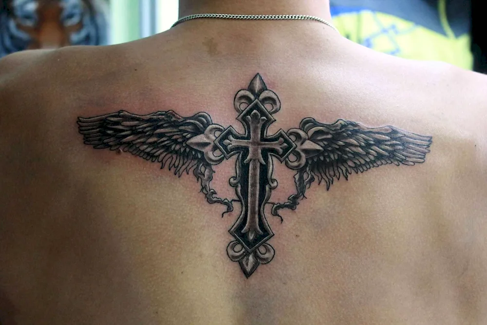 Tattoo cross on back