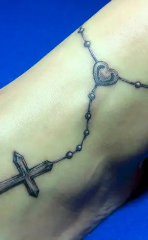 Tattoo cross with chain