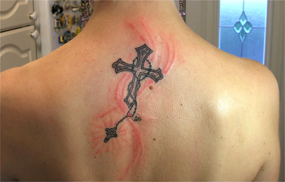 Grave cross tattoo