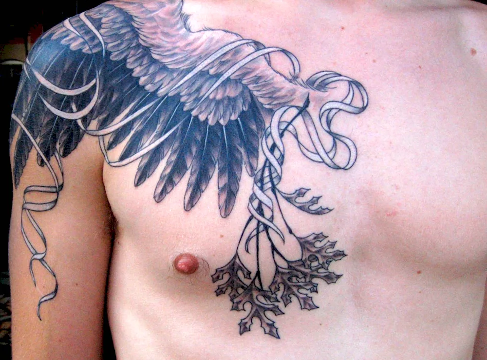 Wings tattoo on chest