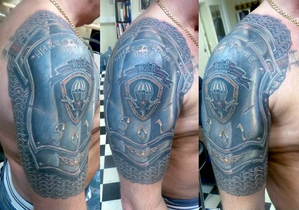 Armour tattoo on the shoulder Scandinavian