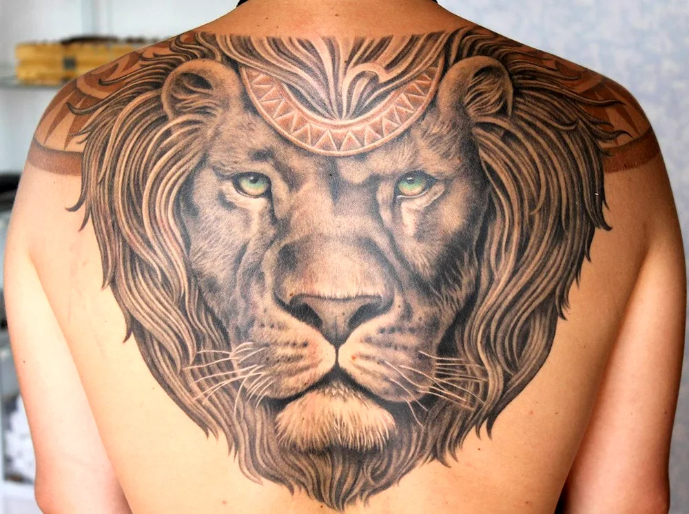 Lion tattoo with cross