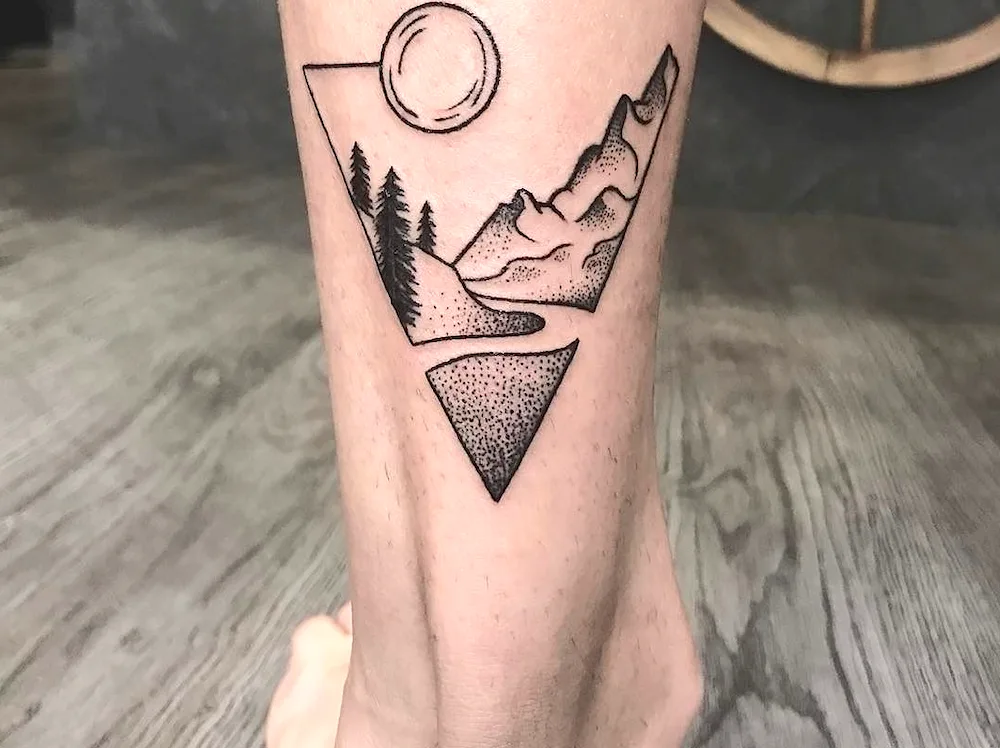 Forest tattoo on leg