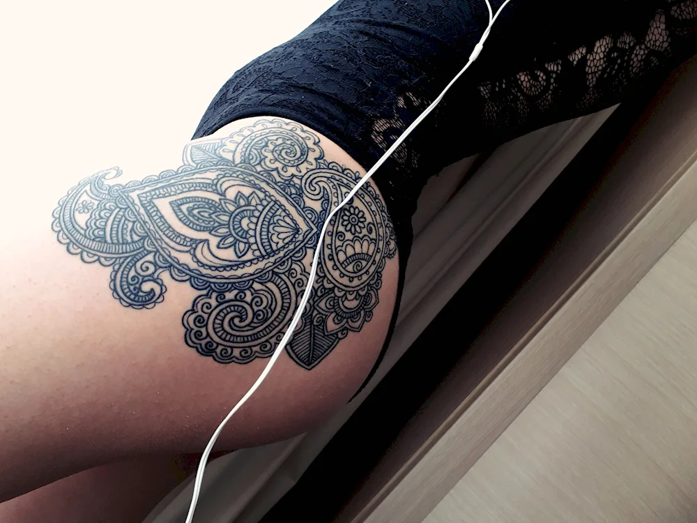 Thigh tattoo