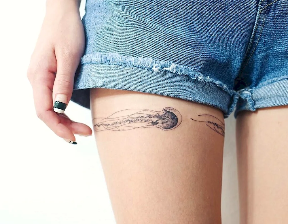 Thigh tattoo