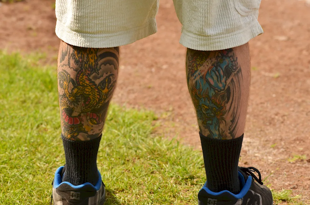 Men's leg tattoo