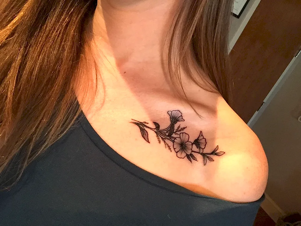 Tattoo on collarbone for girls