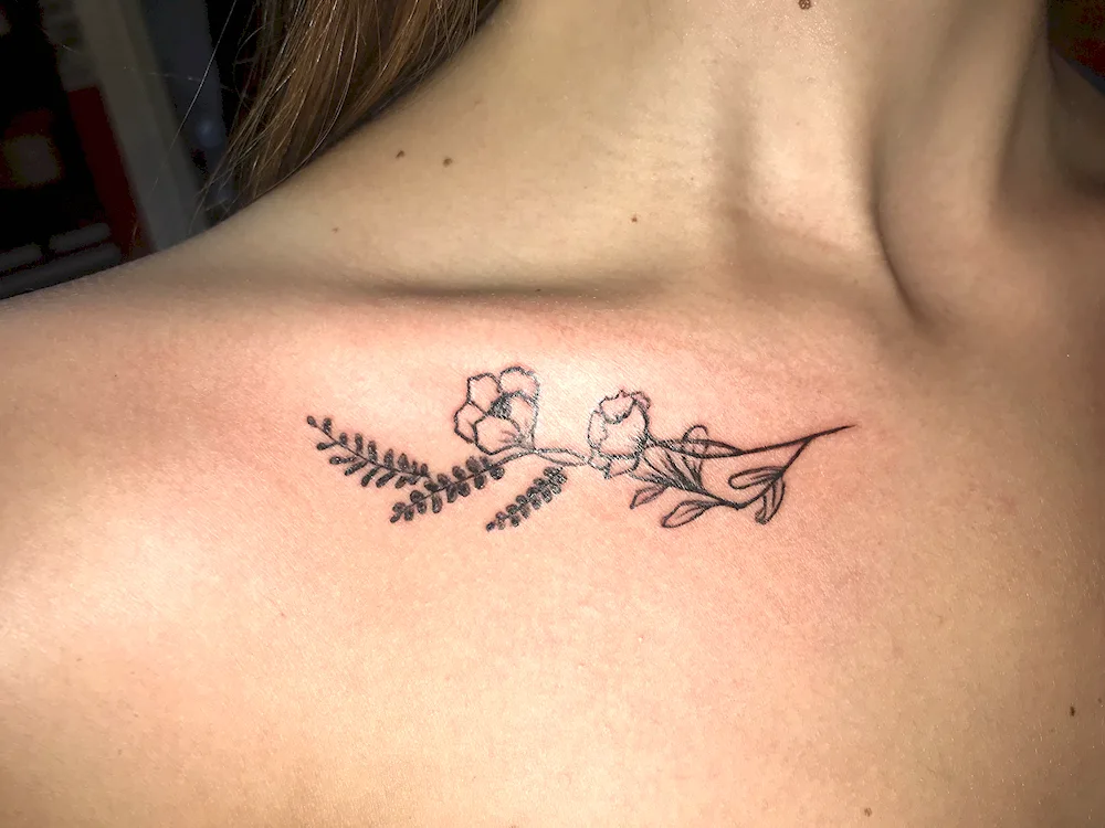 Tattoo on clavicle for girls