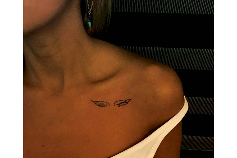 Small collarbone tattoo for girls