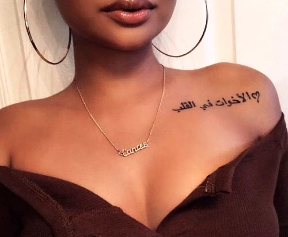 Tattoo on collarbone