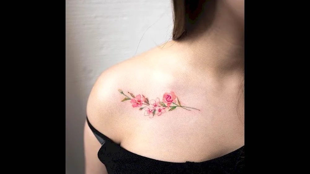 Tattoo on collarbone for girls