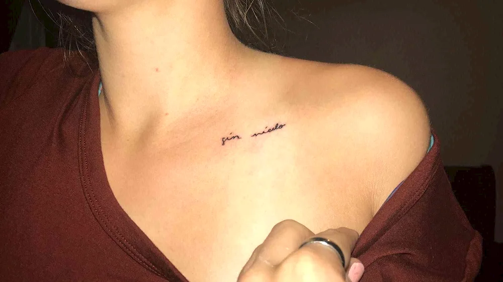 Clavicle tattoo