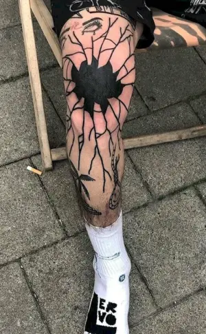 Knee tattoo