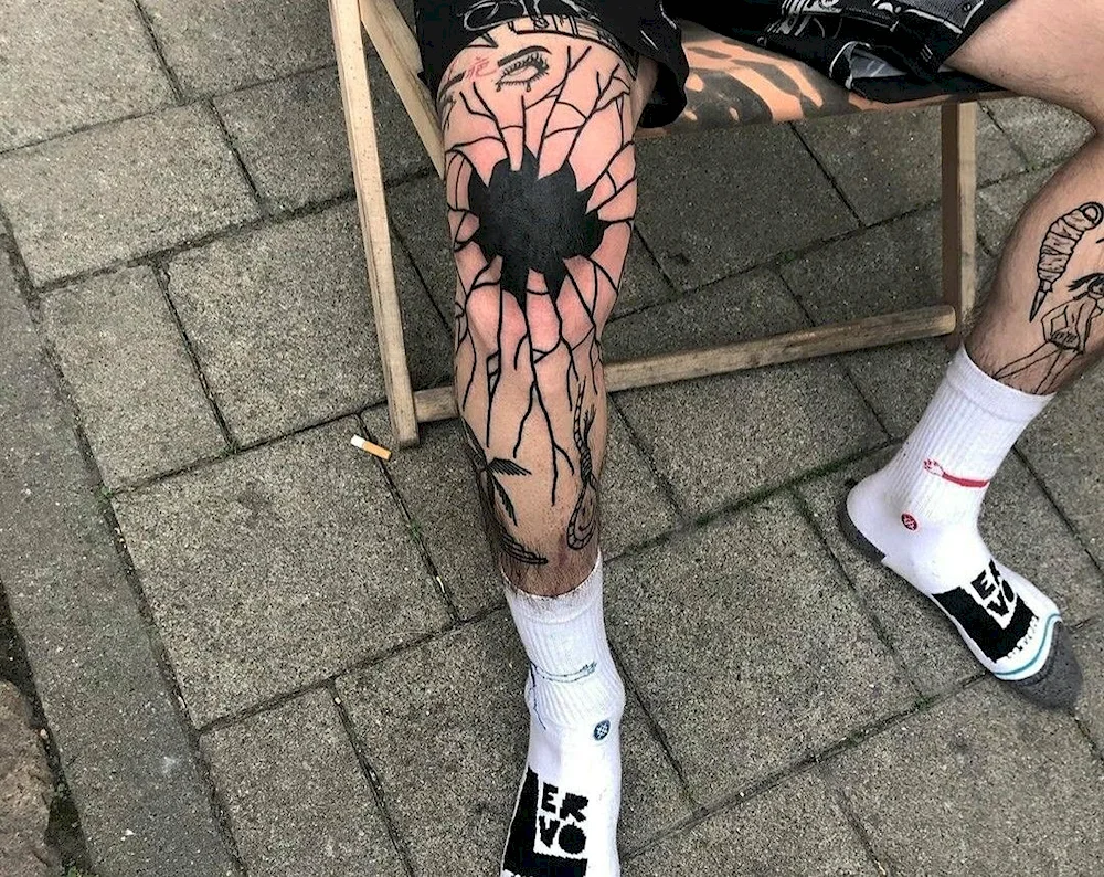 Knee tattoo