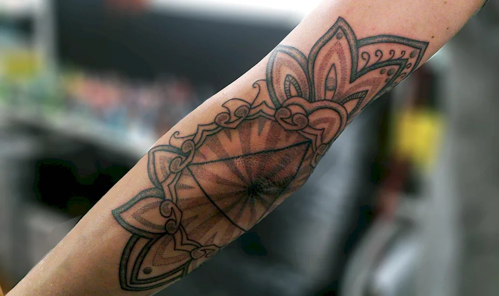 Elbow tattoo