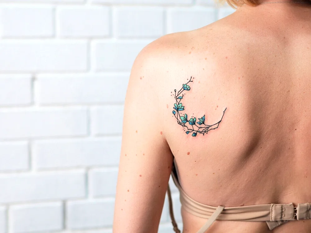 Lotus mandala tattoo on shoulder blade for girls.