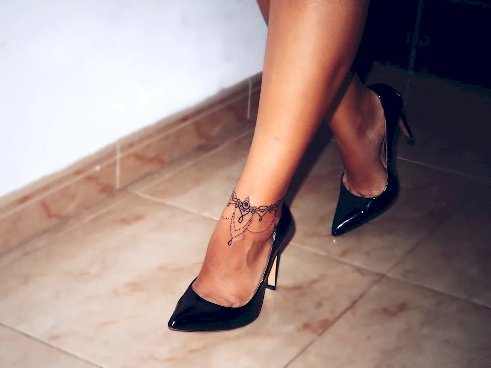 Female leg tattoos