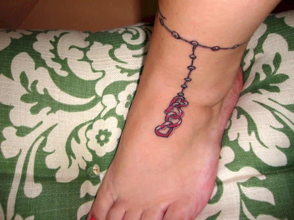 Tattoo bracelet on the leg