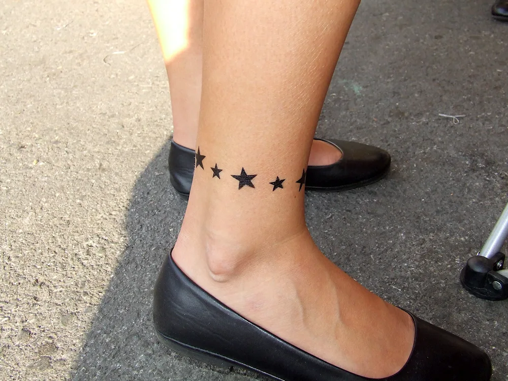 Ankle bracelet tattoo