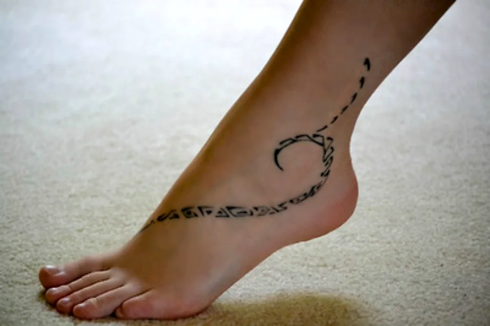 Ankle bracelet tattoo