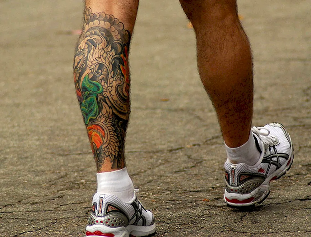 Men's leg tattoo