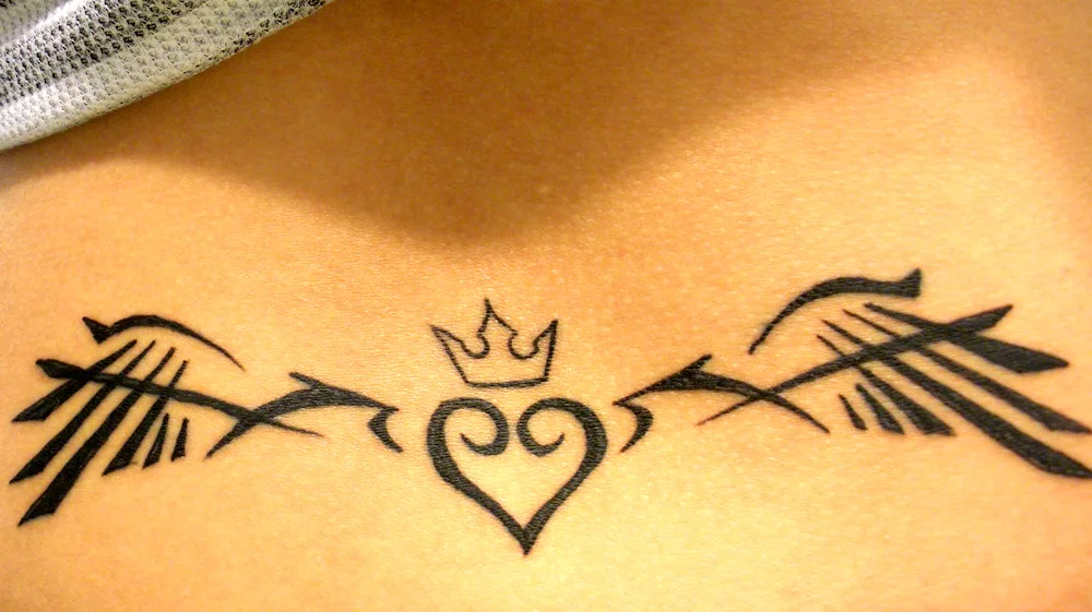 Small neck tattoos on collarbone