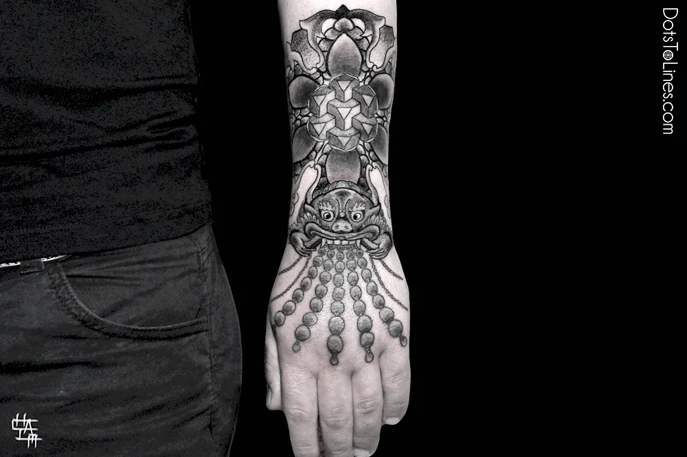 Blackwork forearm tattoo