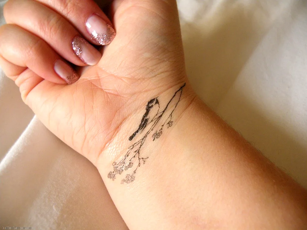 Tattoo on arm for girls